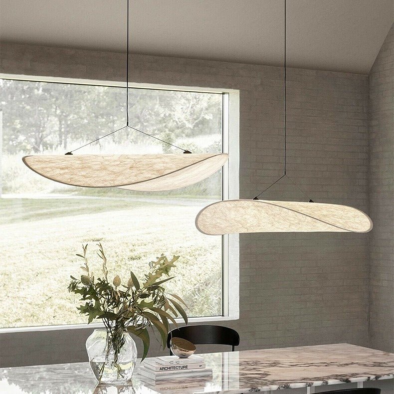 Ceiling light fixture featuring a soft silk shade for ambient home decor illumination