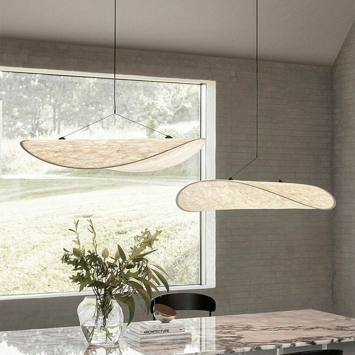 Ceiling light fixture featuring a soft silk shade for ambient home decor illumination