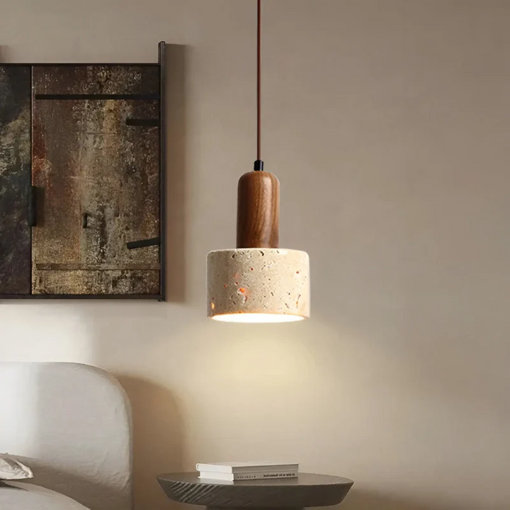 Minimalist travertine ceiling light illuminating a warm and tranquil living space