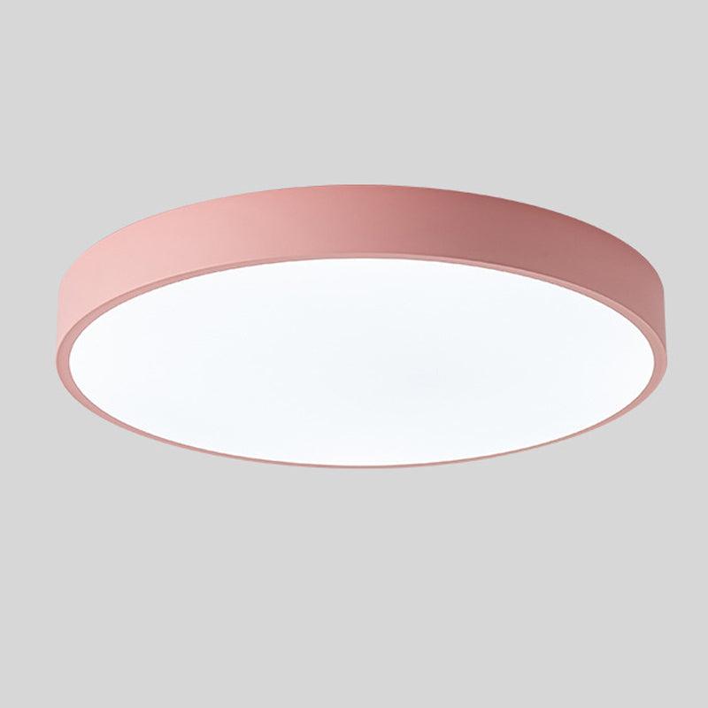 Macaron style round ceiling lamp mounted on a clean white drywall ceiling