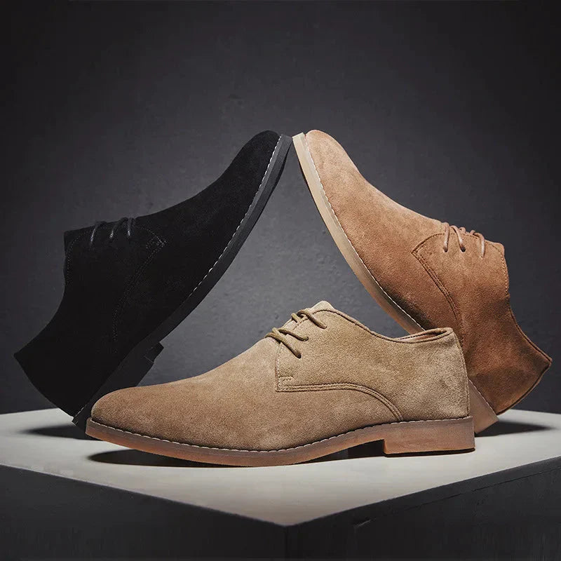 Display of brown and black men's oxford shoes arranged together