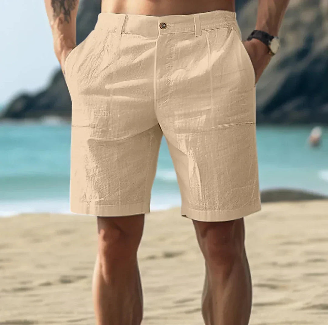 Man wearing khaki casual mid length shorts outdoors