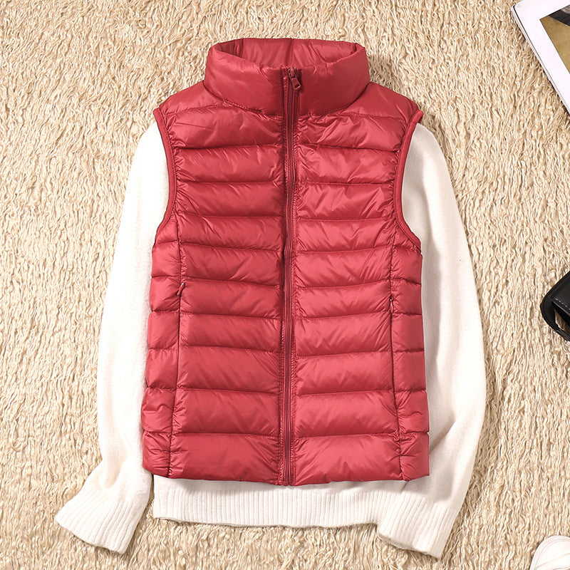 Close-up of quilted pattern and zipper detail on a women's winter outerwear vest.
