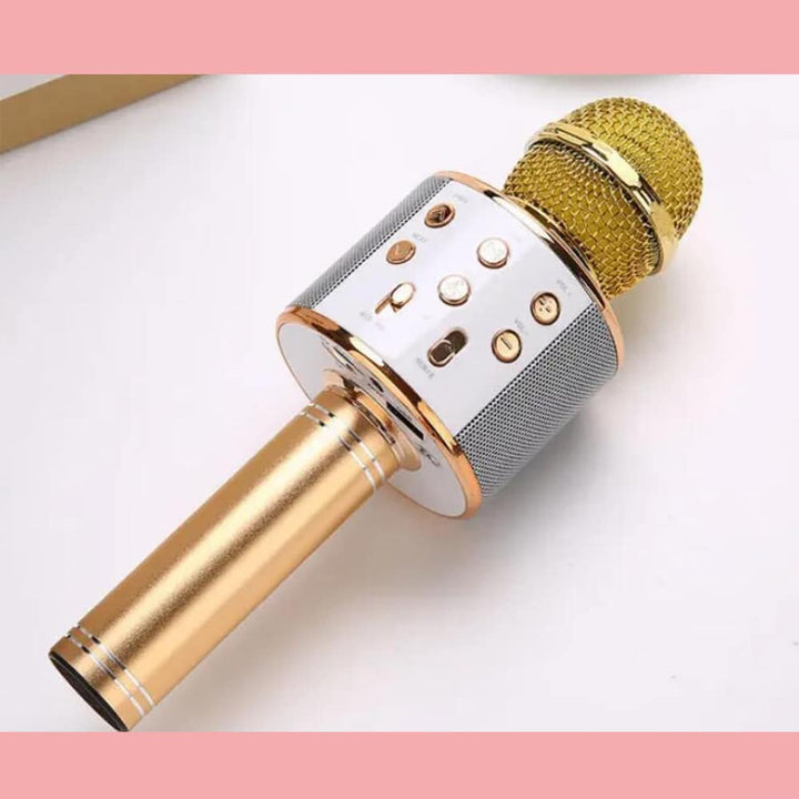 Gold wireless bluetooth karaoke microphone featuring metallic finish and speaker grille