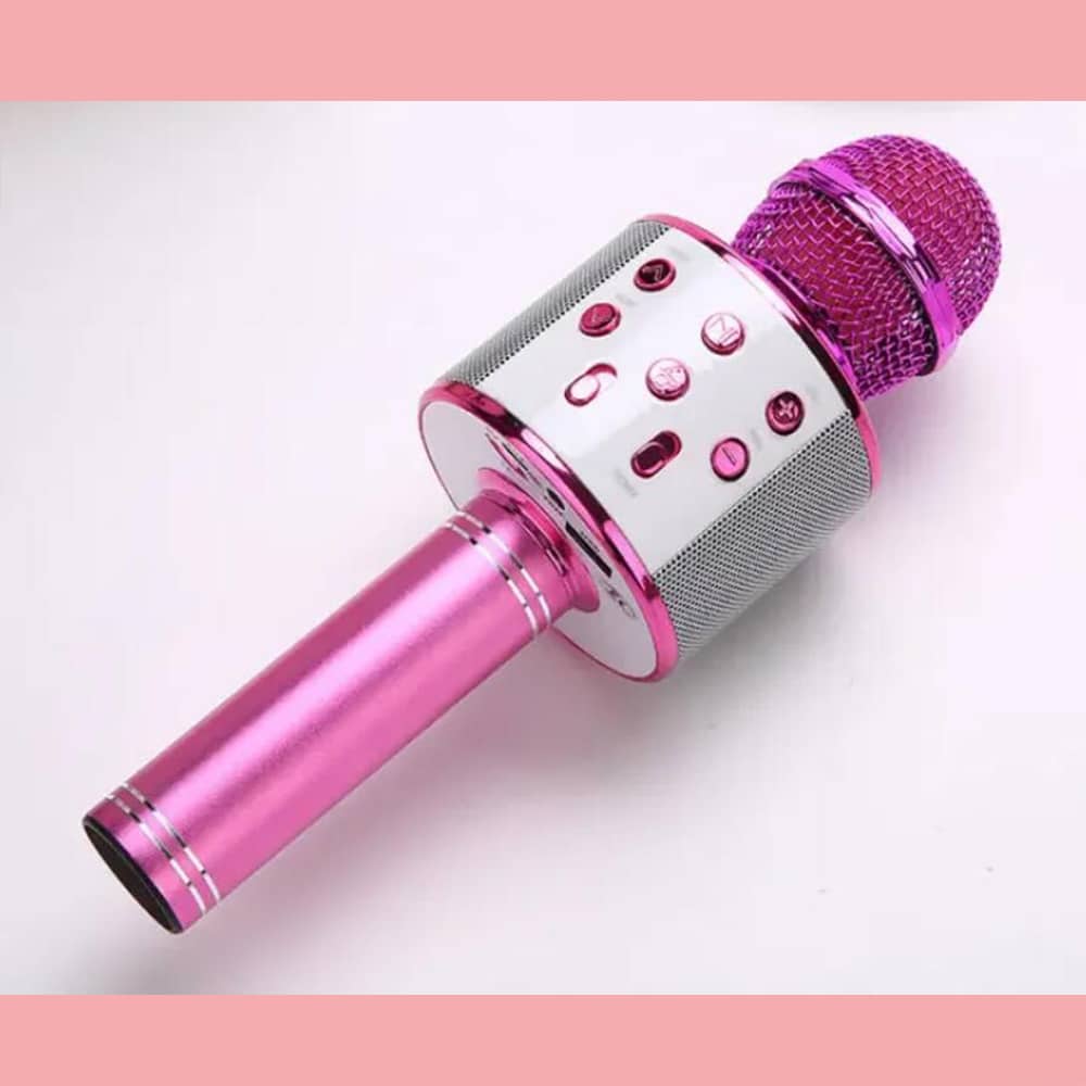 Pink wireless bluetooth karaoke microphone showcasing vibrant color and ergonomic handle