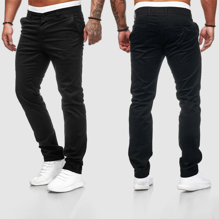 Man wearing black slim-fit chino pants, front and back view