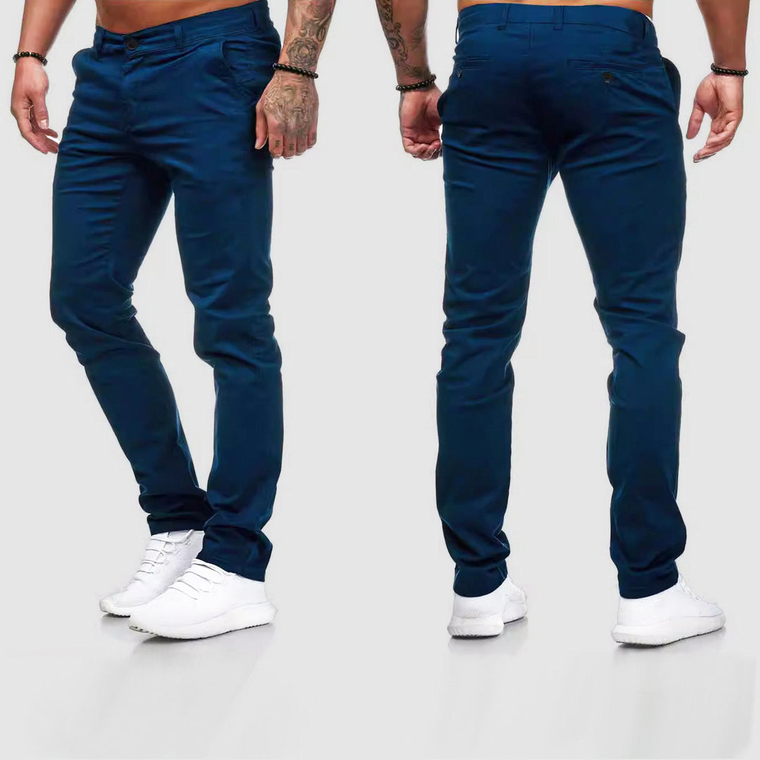 Man wearing blue slim-fit chino pants, front and back view