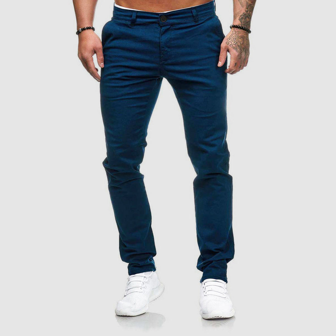 Back view of tapered men's casual pants with pocket detail