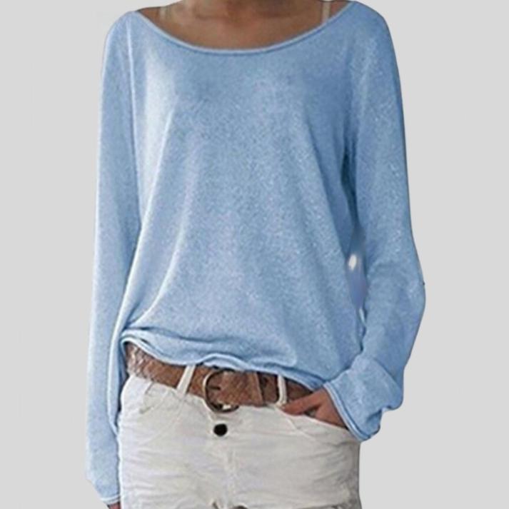Woman wearing a light blue relaxed fit long sleeve sweater