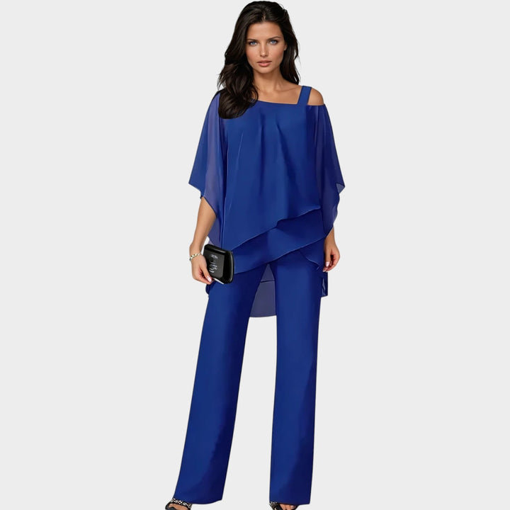 Model wearing the blue variant of the two-piece formal evening outfit