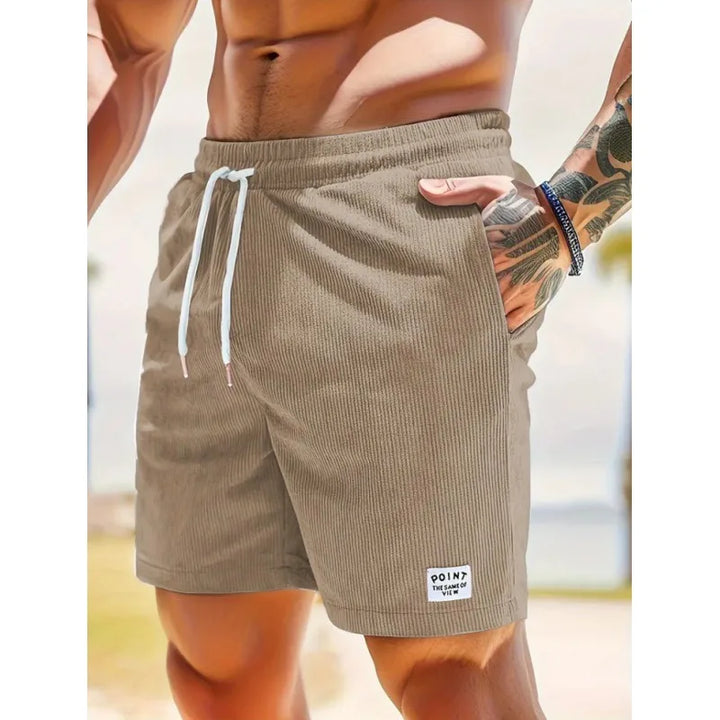 Close-up of elastic waistband and adjustable drawstring on summer shorts