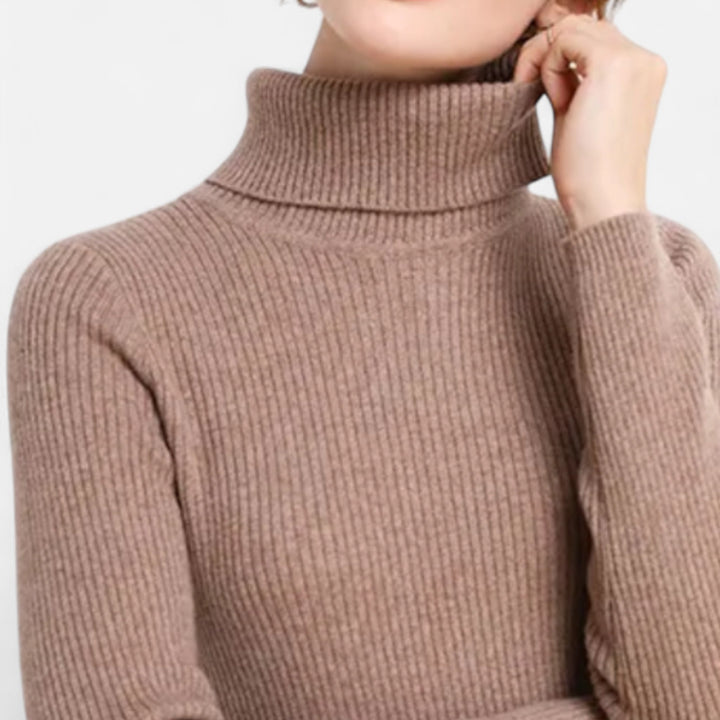 Soft knit texture closeup of women's casual turtleneck shirt