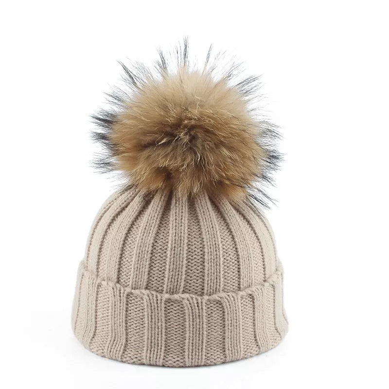 Khaki winter knit beanie with fluffy faux fur pom-pom