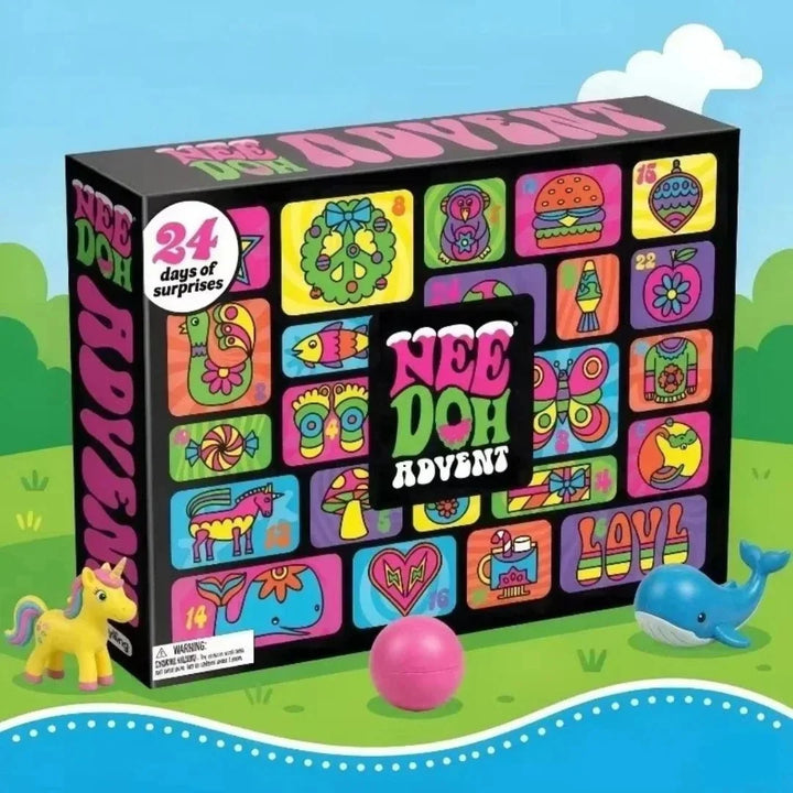 Colorful kids advent calendar box displayed outdoors on grass with squishy toys