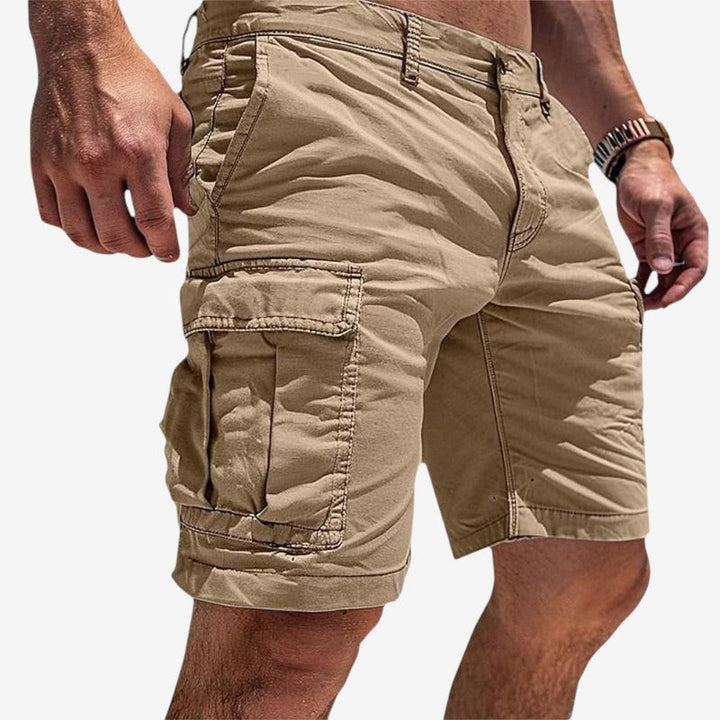 Men's khaki utility cargo shorts designed for outdoor wear