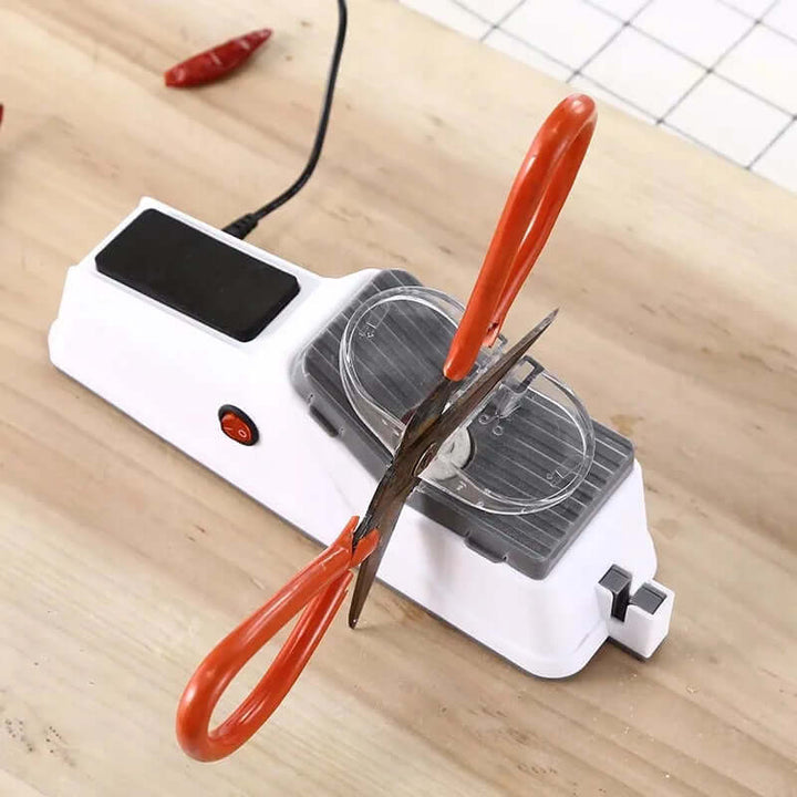 Compact electric knife sharpener with USB rechargeable design for kitchen use