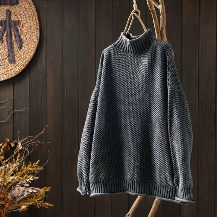 Close-up of soft winter wear fabric on a casual chic women's knitted pullover