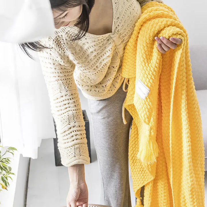 Comfortable woolen blanket ready for chilly evenings at home