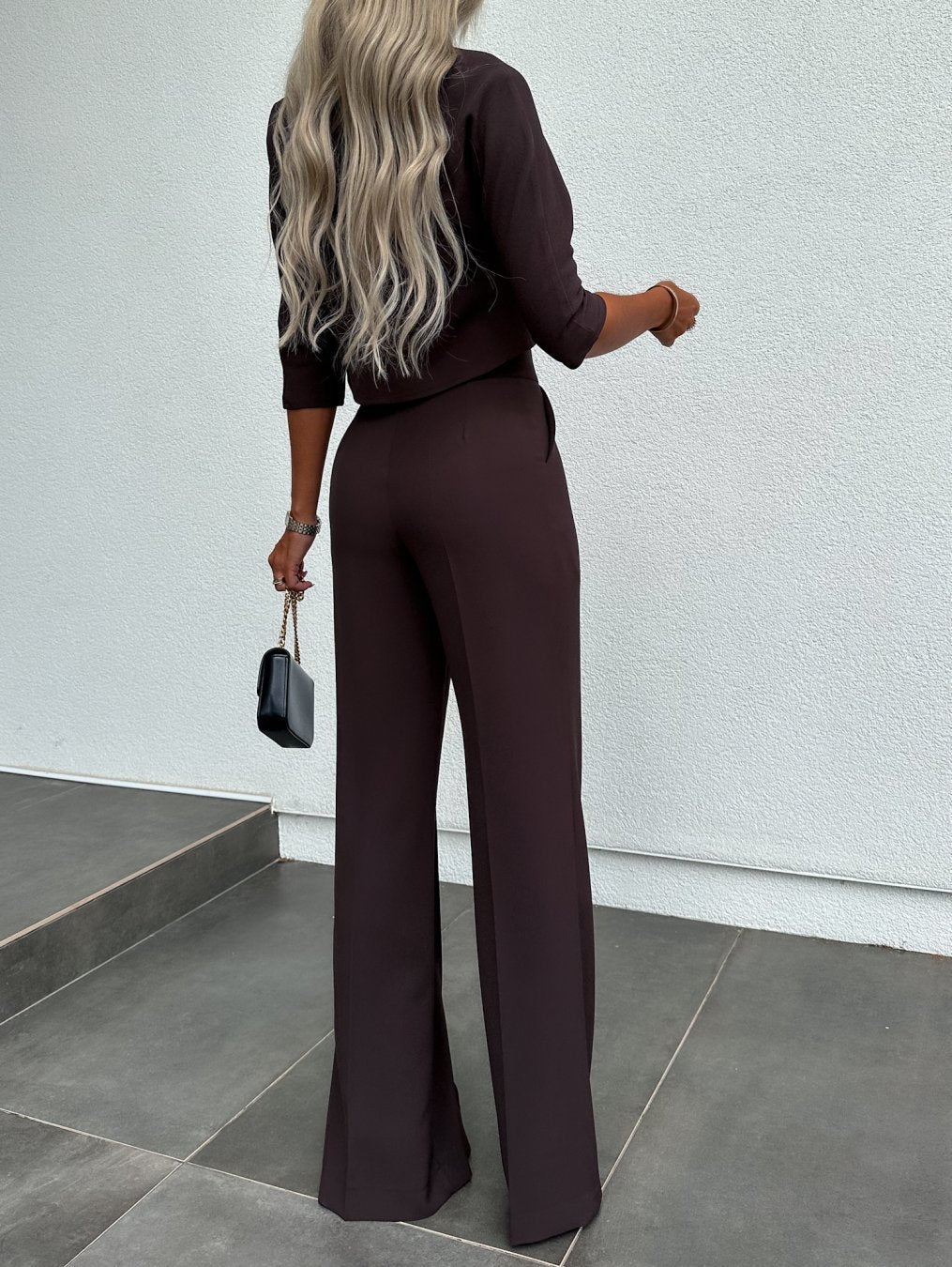 Detailed shot of the waistband on the elegant tailored pants