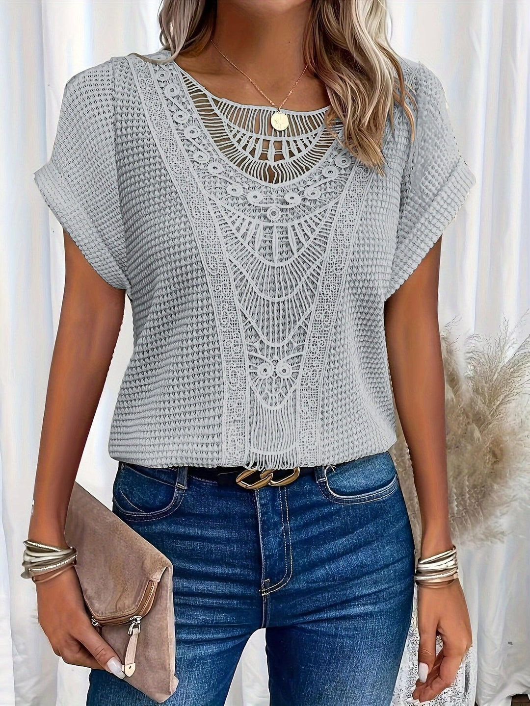 Back view of womens casual wear short sleeve geometric lace top