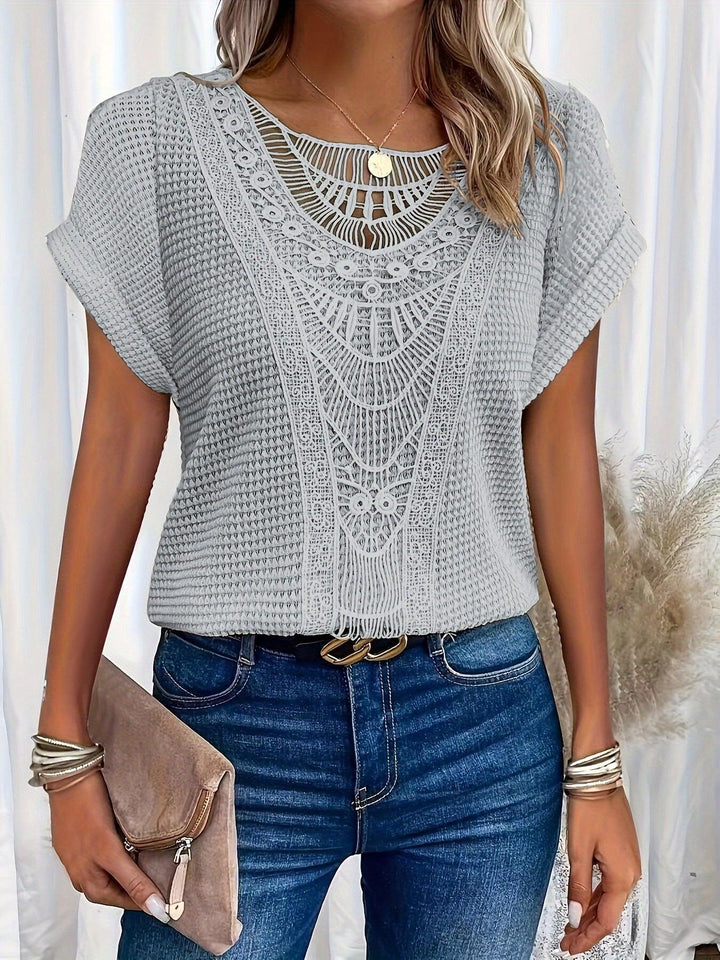 Back view of womens casual wear short sleeve geometric lace top