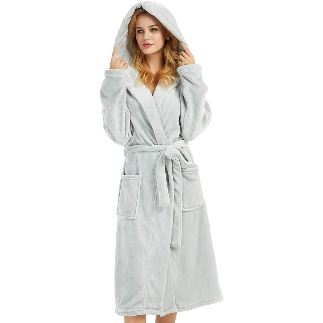 Plush women's hooded fleece bathrobe in soft fabric for relaxing at home