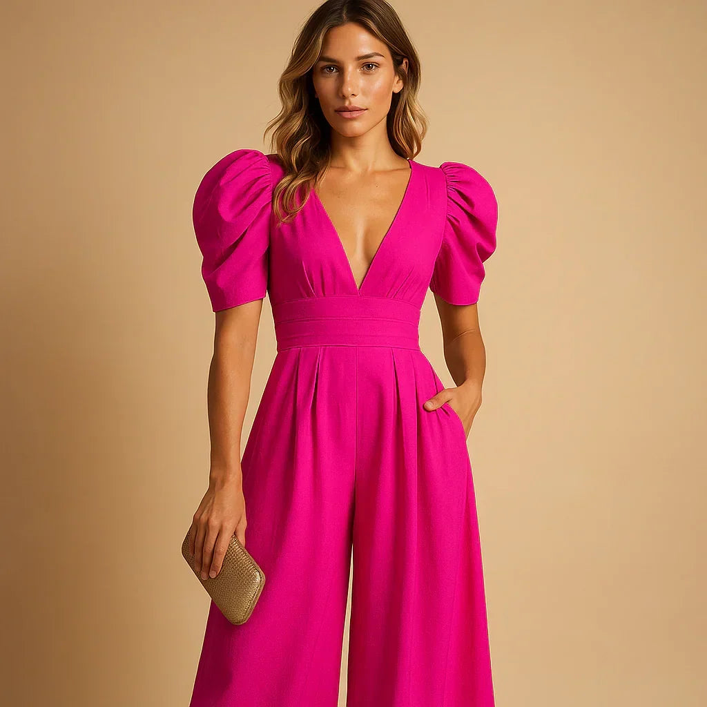 Back view of a sophisticated women's party wear jumpsuit with tailored wide legs and puff sleeves