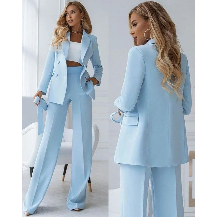 Full view of women's double-breasted tailored blazer and straight-leg trousers suit