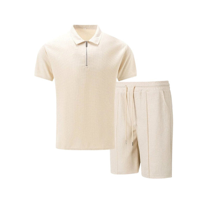 Beige men's short-sleeved zip-neck polo and drawstring shorts set flat lay