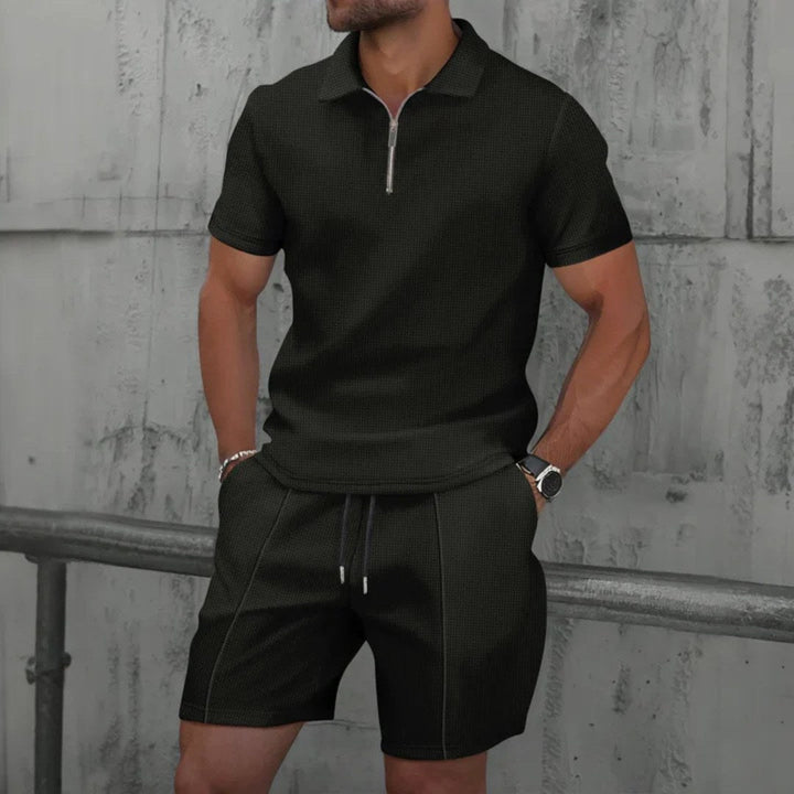 Close-up of the zip polo collar on the mens two-piece summer outfit