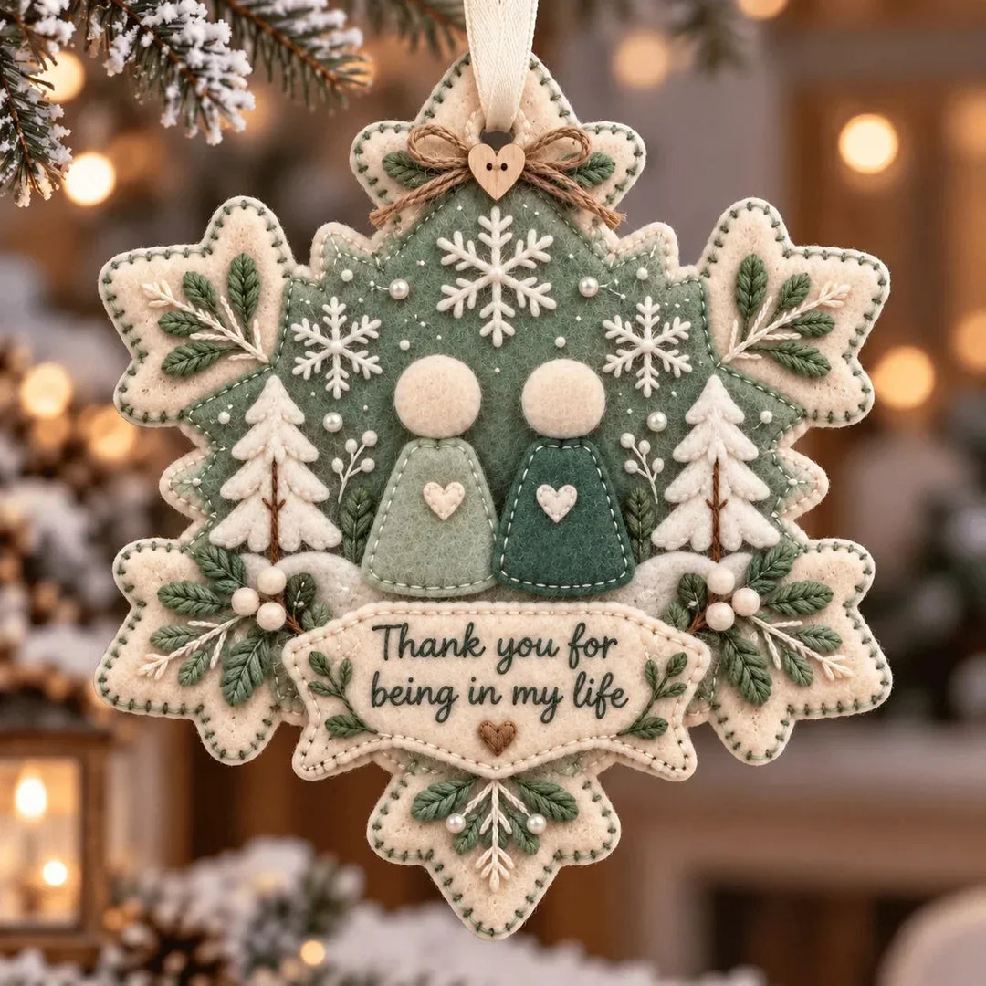 Snowflake layered felt thank you keepsake ornament hanging on a Christmas tree