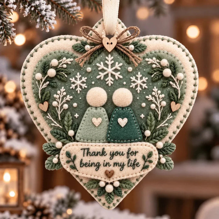 Handmade felt thank you keepsake ornament hanging on a Christmas tree for holiday decor