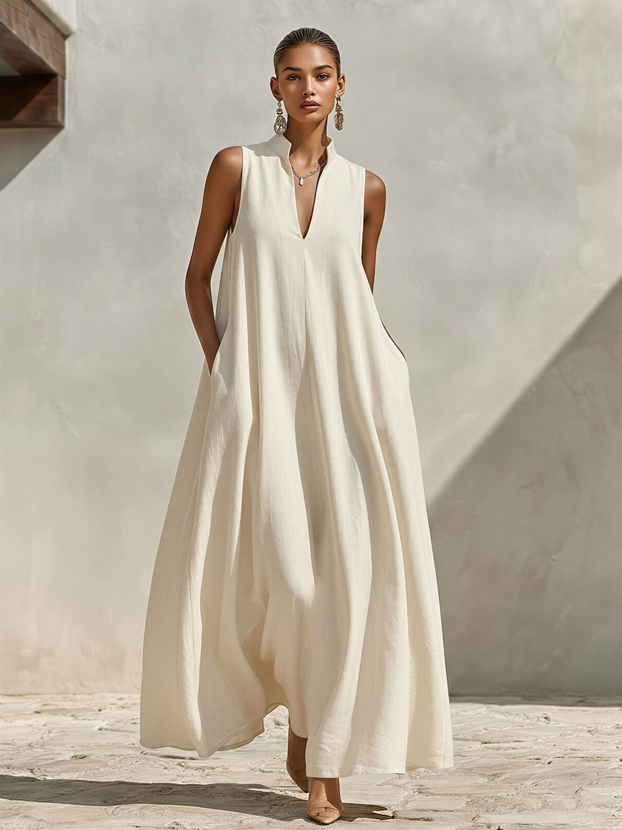 Full-length view of the cream sleeveless maxi dress on a model