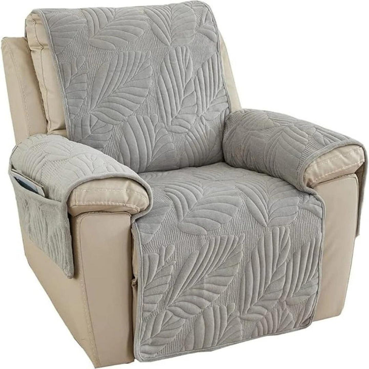 Close-up of botanical leaf quilted texture on armchair slipcover