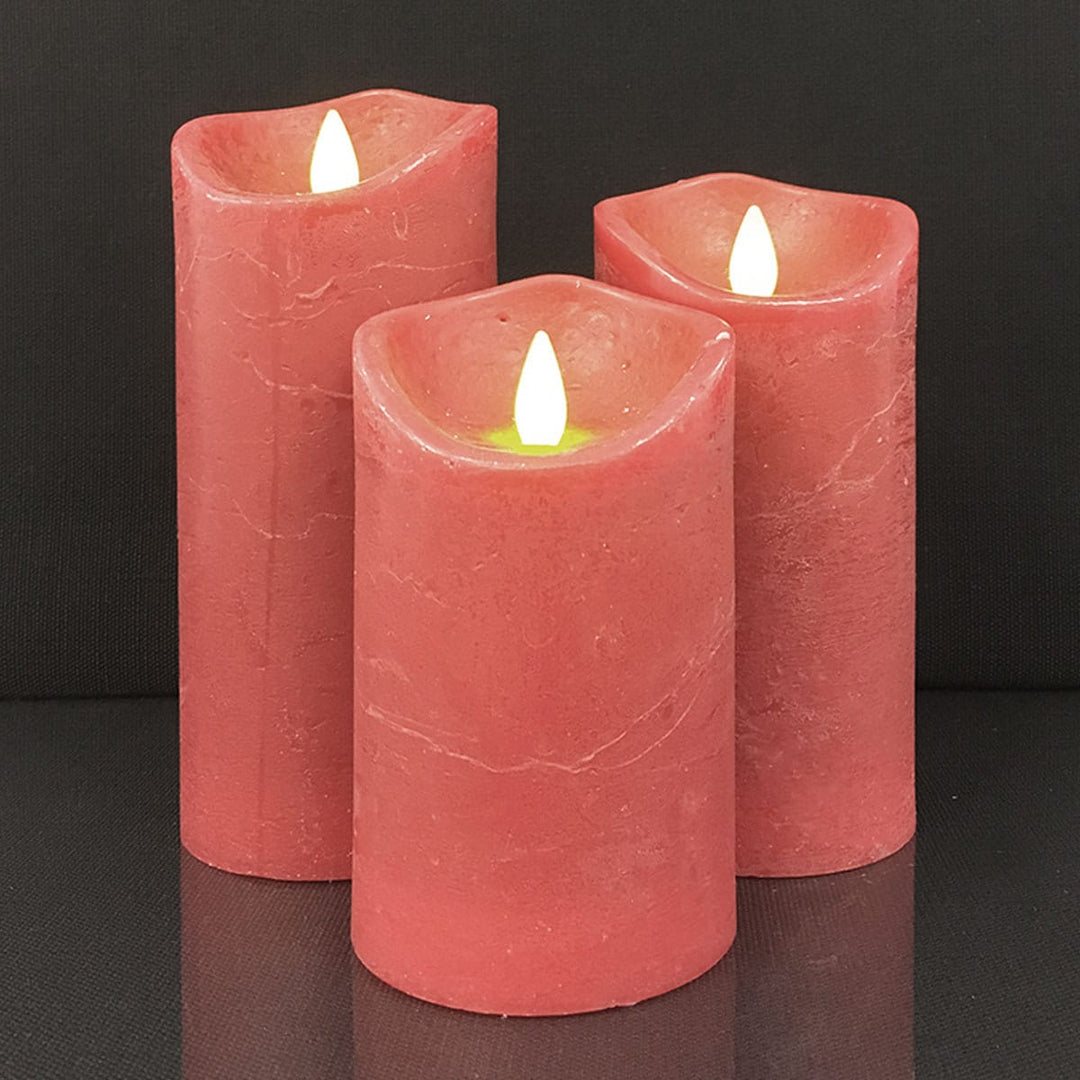 Close-up of realistic 3D moving flame on a flameless rustic pillar candle