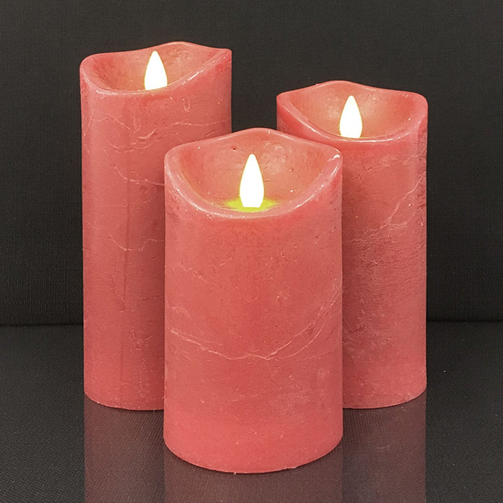 Close-up of realistic 3D moving flame on a flameless rustic pillar candle