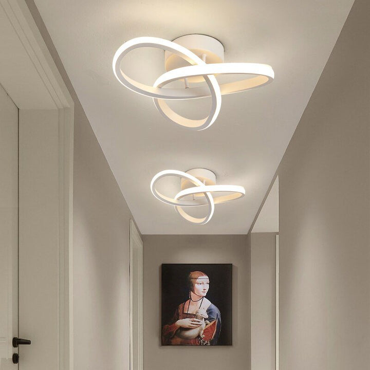 White Clover modern LED ceiling lamp installed in a bright hallway ceiling