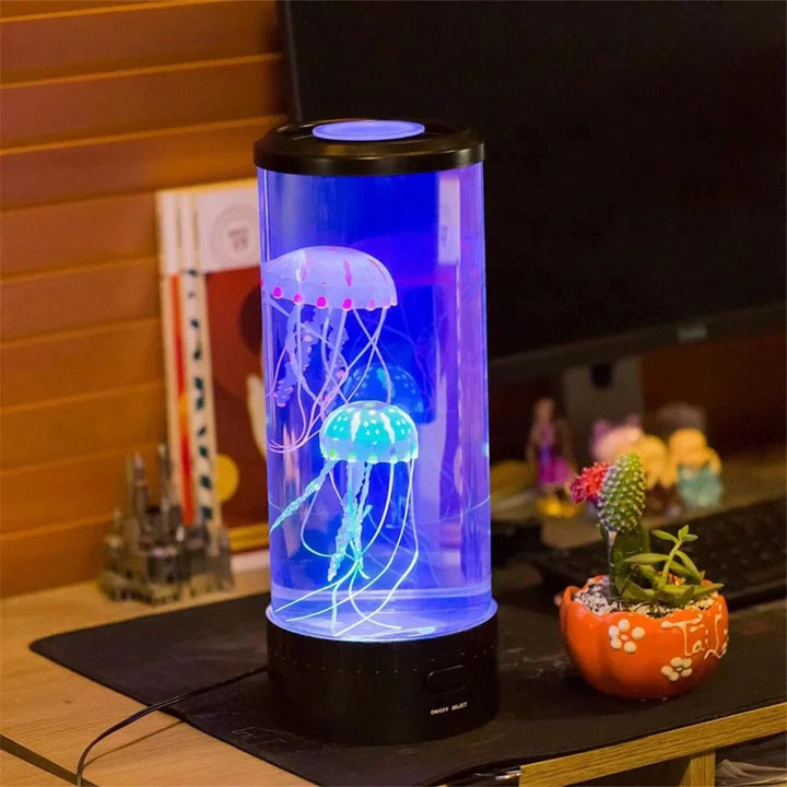 LED jellyfish lava lamp illuminating a cozy desk setup with plants