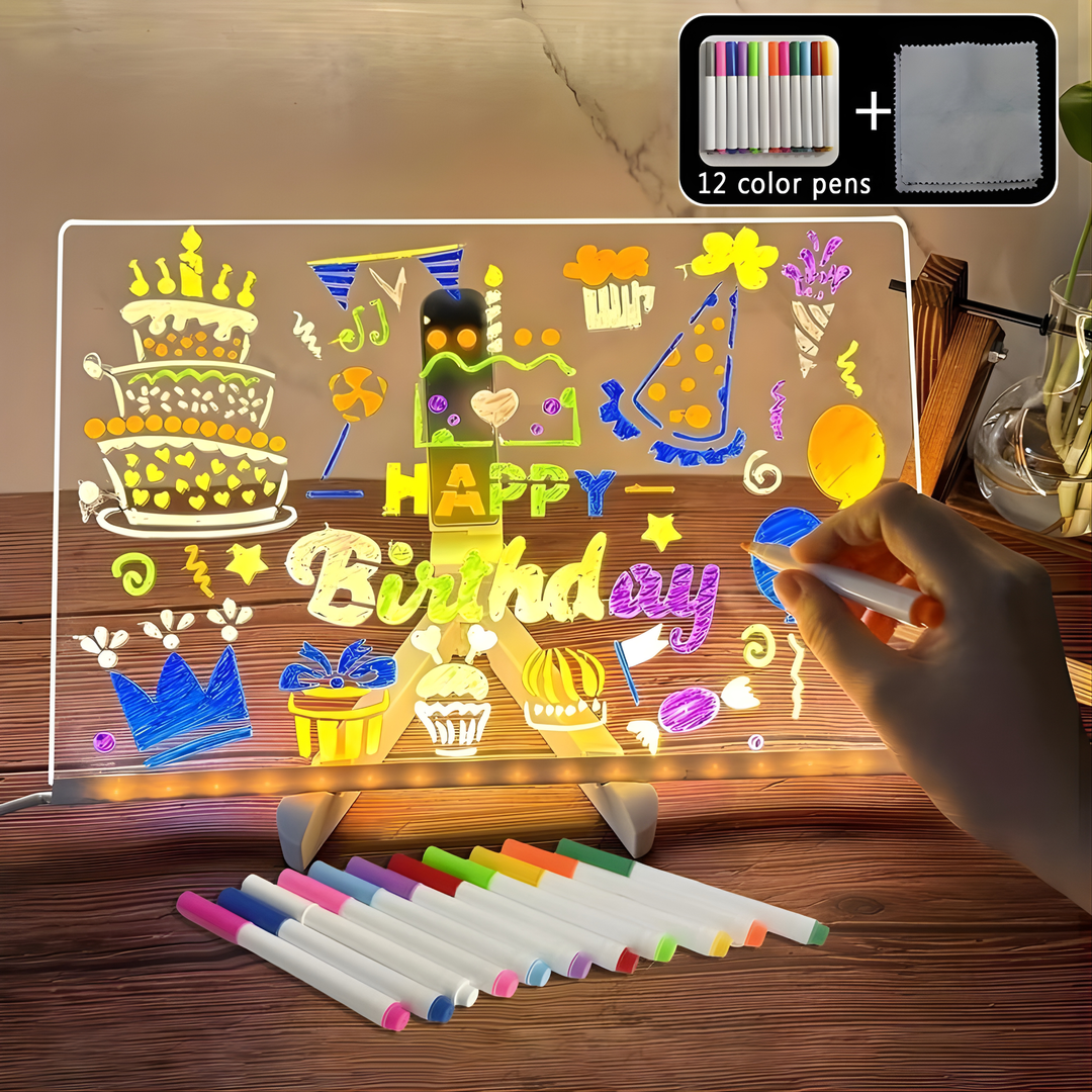 Person drawing birthday art on the illuminated LED light panel with neon markers