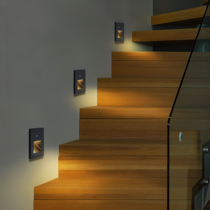 Sleek white LED night light mounted flush against a contemporary interior wall