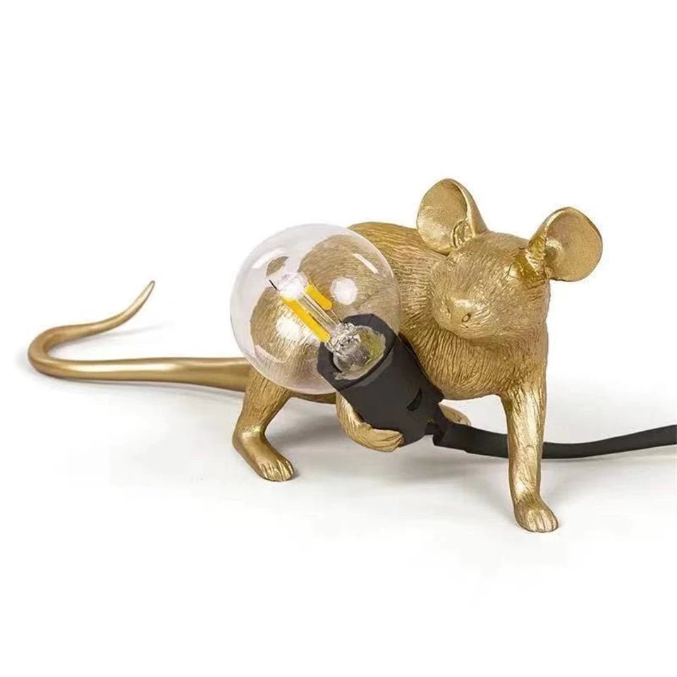 Side profile of the unique LED mouse table lamp casting soft accent lighting