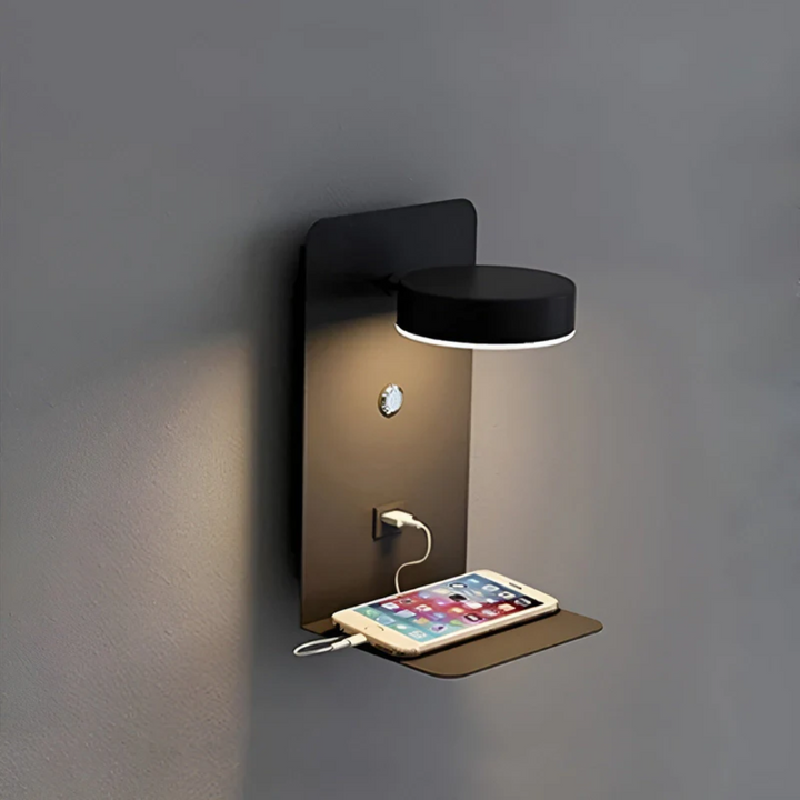 Black LED wall lamp mounted on a grey wall with a smartphone connected to the USB port