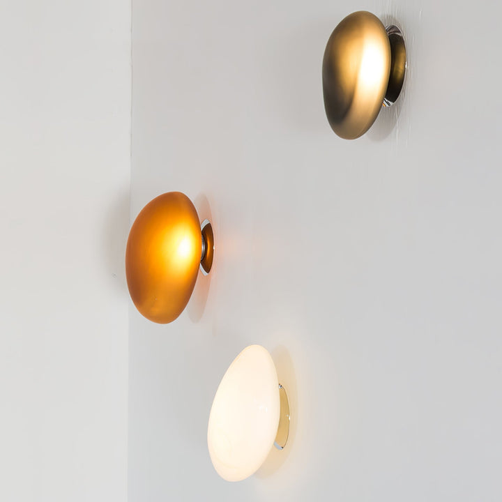 Sleek glass wall sconce with adjustable light color for home decor