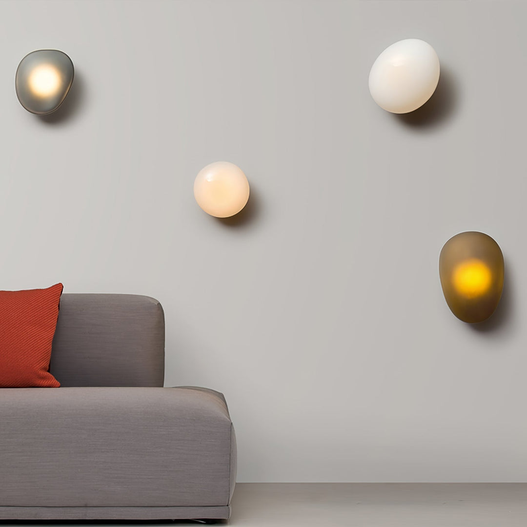 Modern oval LED wall lamp emitting warm ambient interior lighting