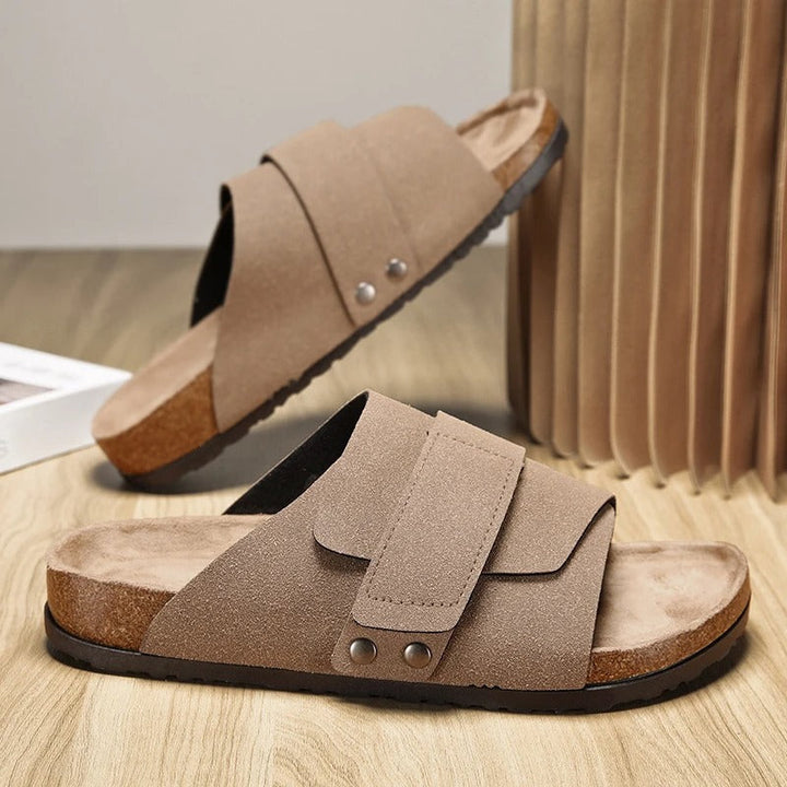 Close-up view of the men's sand slide sandals showcasing the textured finish and contoured footbed