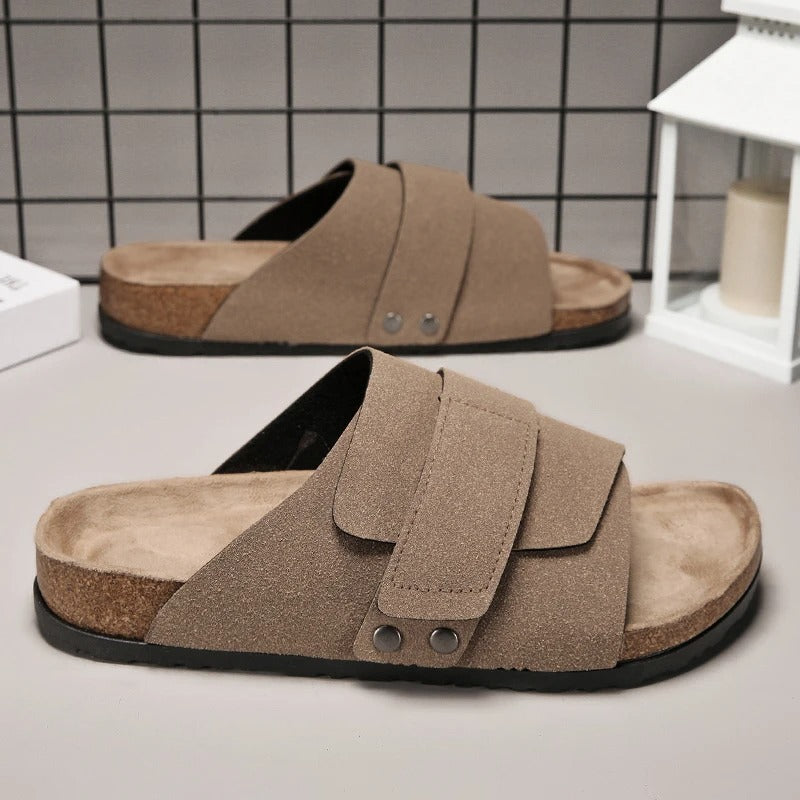 Side profile of the men's sand slide sandals highlighting the chunky tread sole and adjustable strap