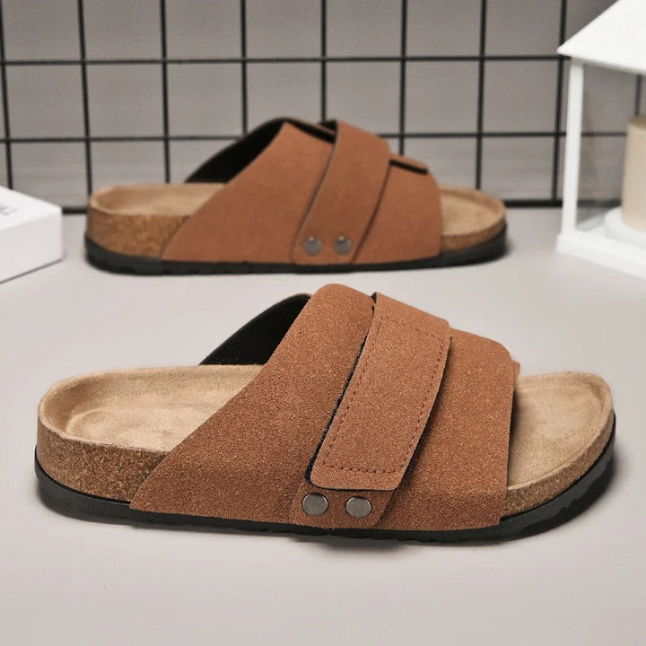 Close up of textured footbed on mens comfortable slides footwear