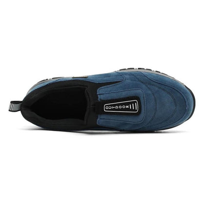 Top-down view of blue walking shoes showing textured upper