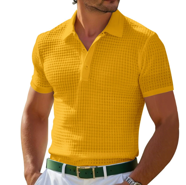 Close up of fabric detail on a men's textured short sleeve polo shirt for summer.