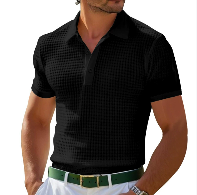 Man wearing a black textured regular fit short sleeve polo shirt